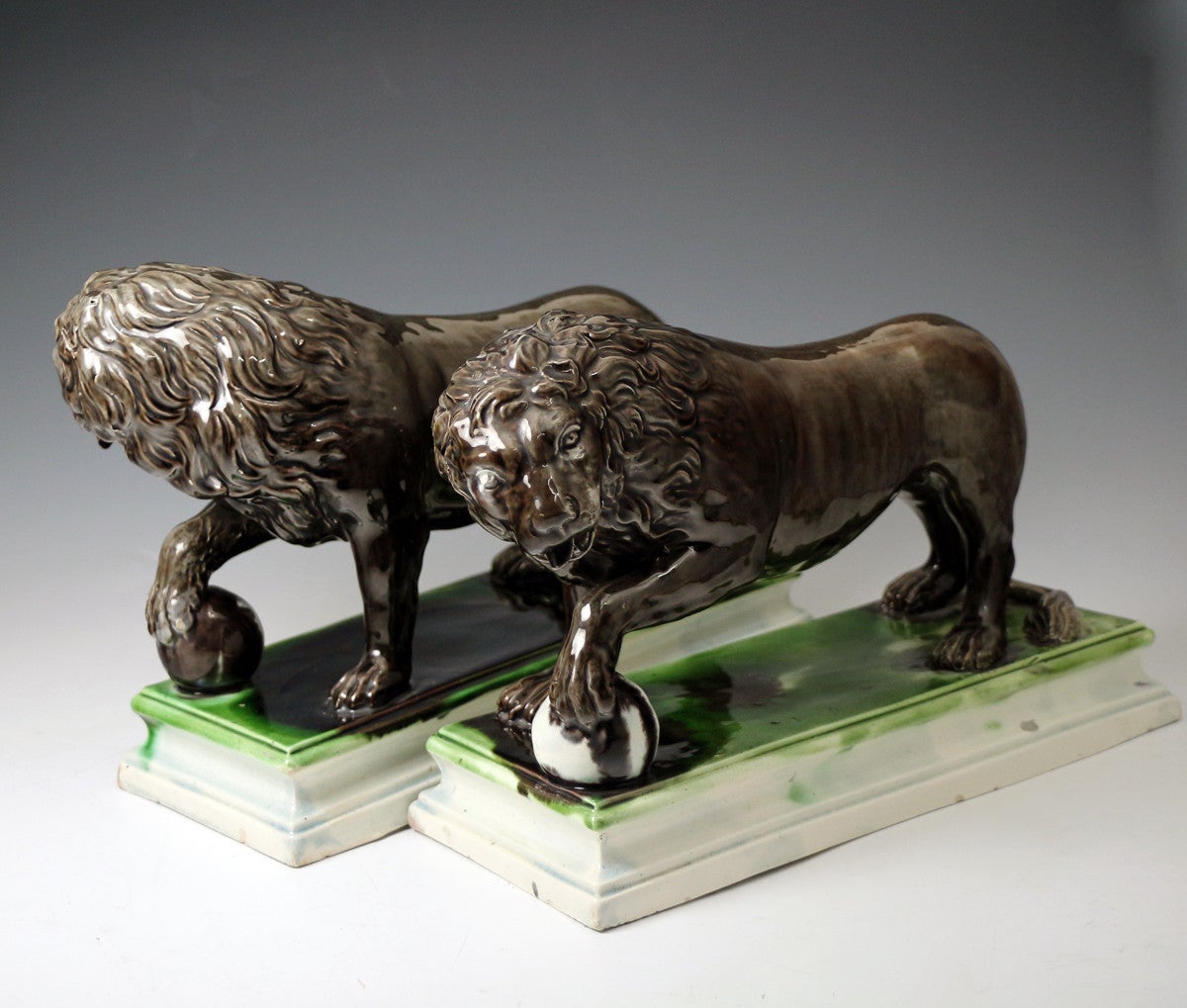 18th Century Pair of Staffordshire Pottery Figures of Lions by Ralph Wood