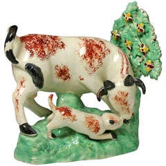 Title  Staffordshire pottery bull baiting figure group with rare bocage feature 