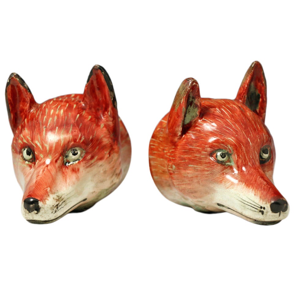 Pair of antique figures of fox head stirrup cups, Staffordshire pottery c1820 