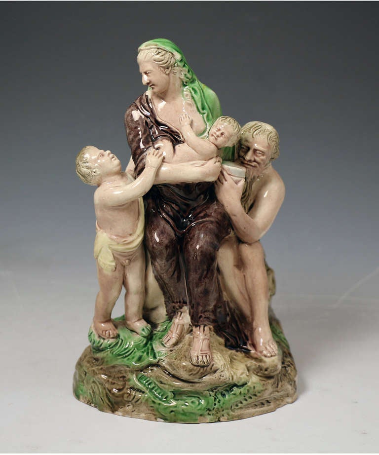 Antique English Staffordshire pottery figure by Ralph Wood titled ROMAN CHARITY. 
One of the few groups produced by Ralph Wood comprising of four figures. 
The figure bears the impress mark under the base 92 denoting the catalogue reference. 
The