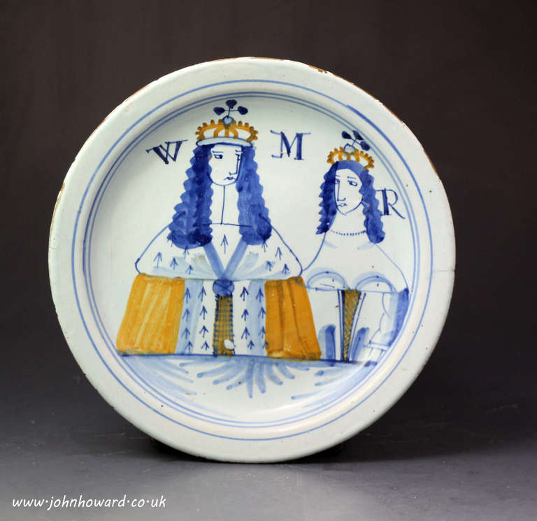 Antique English delft ware pottery plate commemorating King William and Queen Mary late 17th century 

A good antique delftware pottery plate celebrating King William and Queen Mary dating to the 1689/95 period.
The portraits are exceptional on