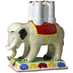 Pottery Figure of an Elephant Carrying a Castle Form Incense Burner