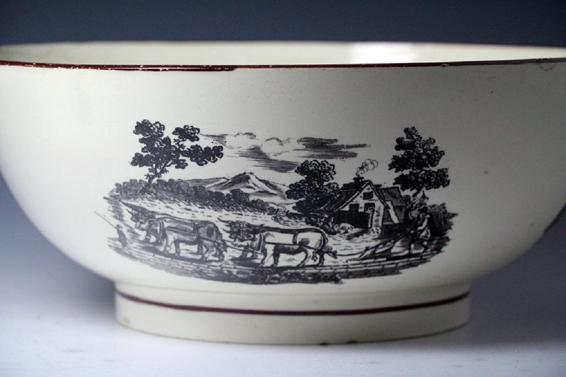 English Large Creamware Pottery Bowl with Underglaze Transfer Prints of Rural Scenes