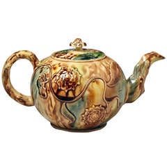 Staffordshire Cream-colored earthenware teapot and cover, Whieldon type glaze