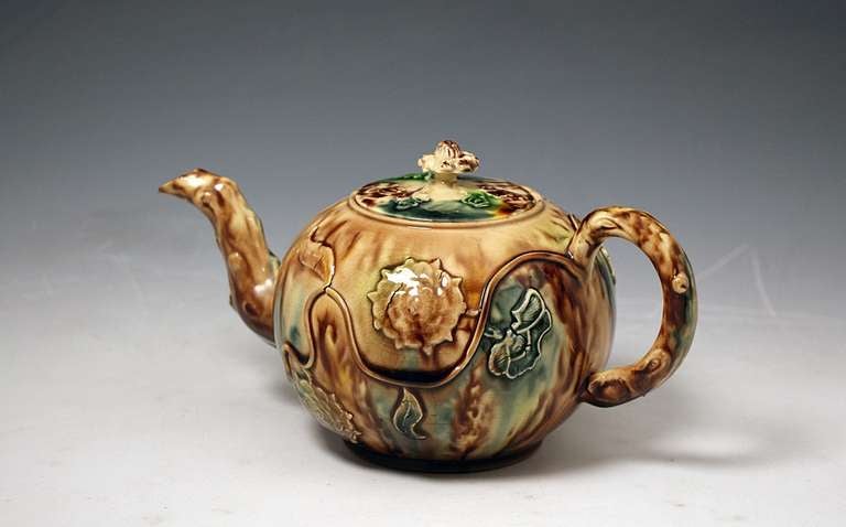 English Staffordshire Cream-colored earthenware teapot and cover, Whieldon type glaze