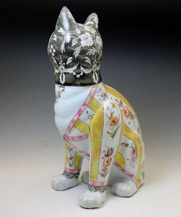 French Galle pottery figure of a comical cat with glass eyes. c1900