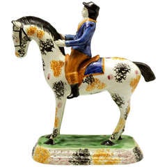 Antique Yorkshire pottery horse and rider in Pratt colors c1810