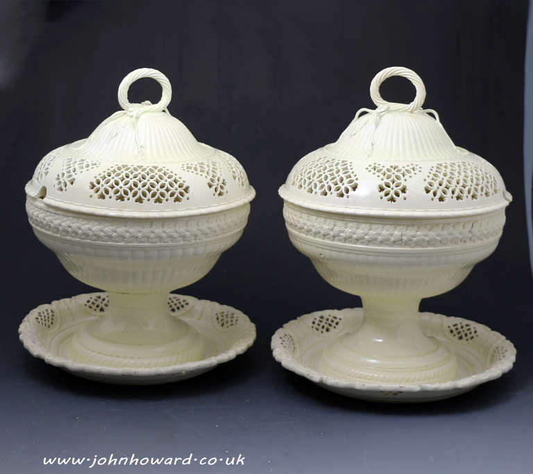 Two creamware pottery comports and covers with matched stands. Fine reticulated decoration to the covers and stands with relief moulded bowls. These plain creamware pottery examples are very fine quality and have stunning decorative elegant and