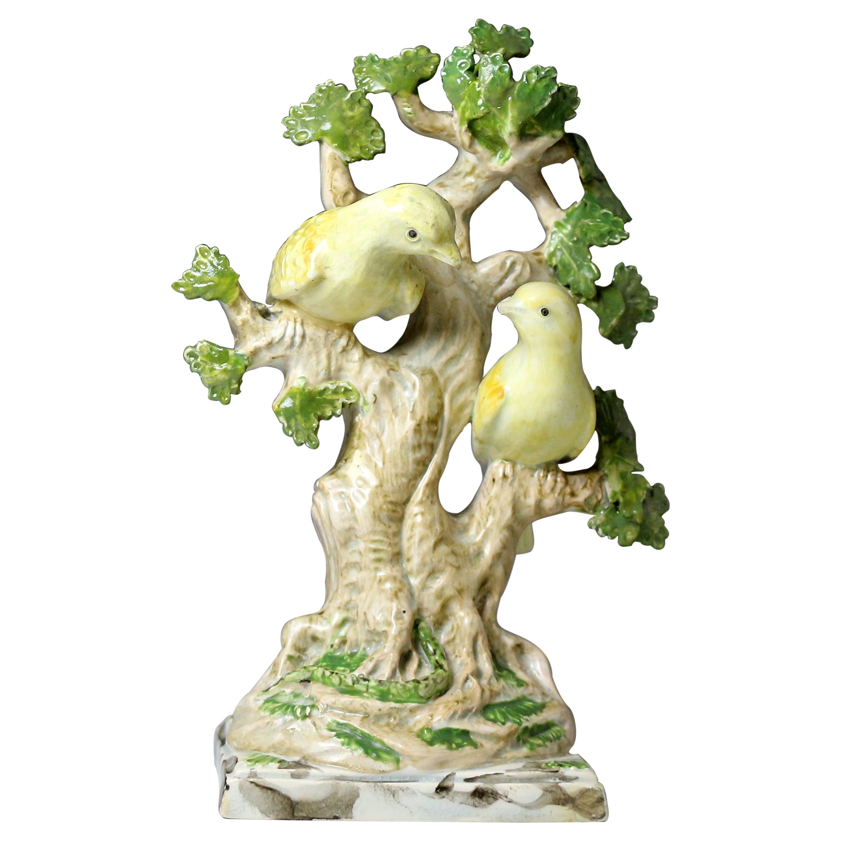 Antique Staffordshire pearlware figure with bcage with birds in branches