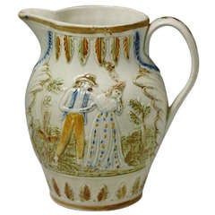 Antique English pottery pitcher in Pratt Ware