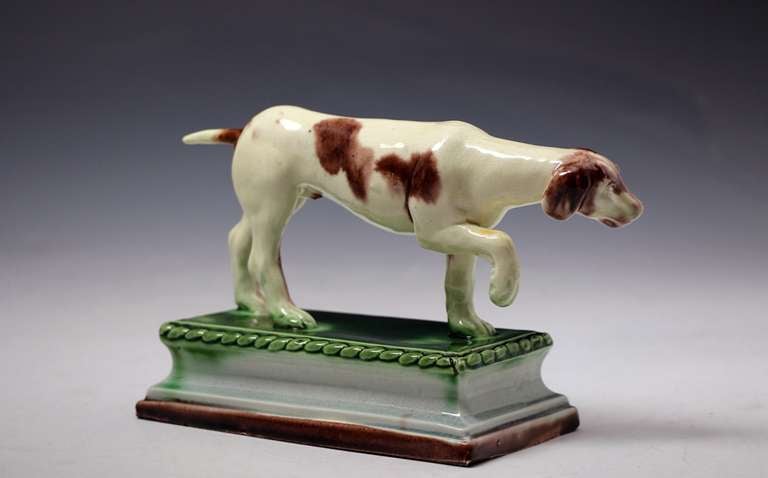 A fine and previously unrecorded Ralph Wood (Burslem Works Staffordshire)figure of a sporting hound modelled standing on a base. This rare figure is exceptionally well modelled and glazed in the distinctive Ralph Wood fashion. 

Provenance: