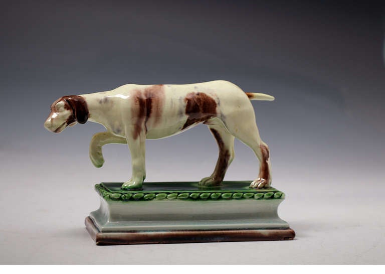English Ralph Wood Staffordshire Pottery figure of a hound on base 18th century