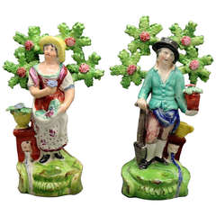 Antique Staffordshire Figures of a Male and Female Gardeners