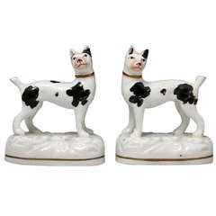 Antique Staffordshire figures of standing dogs early Victorian period