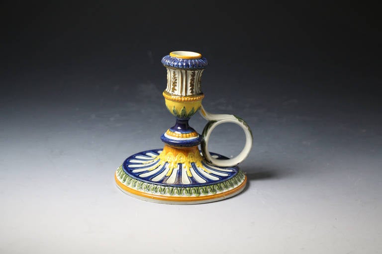 Antique English pottery prattware chamber candlestick. This is a very rare form in prattware. The piece has strong pratt colors in underglaze oxides and is well formed, a very pleasing previously unrecorded example.