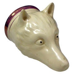 Antique Staffordshire pottery figure of a fox head stirrup cup