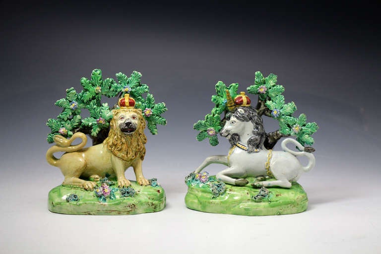 Pair of antique Staffordshire pottery figures of the Lion and Unicorn with boacge by Walton c1820 

A good pair of antique Staffordshire pearlware bocage pottery figures by Walton of the Lion and Unicorn. 
These charming pairs are increasingly