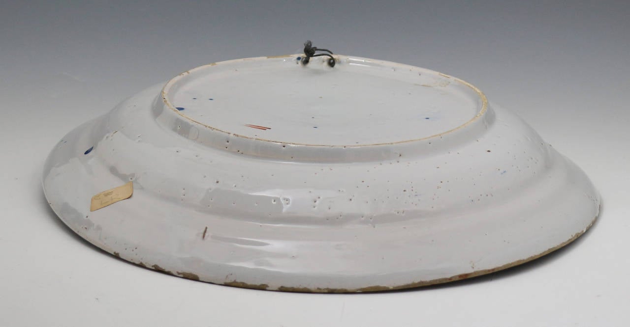 English Delftware Charger Decoarted in Polychrome, Early 18th Century