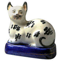 Antique Staffordshire Pottery Figure of a Black and White Cat