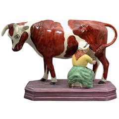 Antique Large Figure of Cow and Milk Maid with a Pink Luster Base