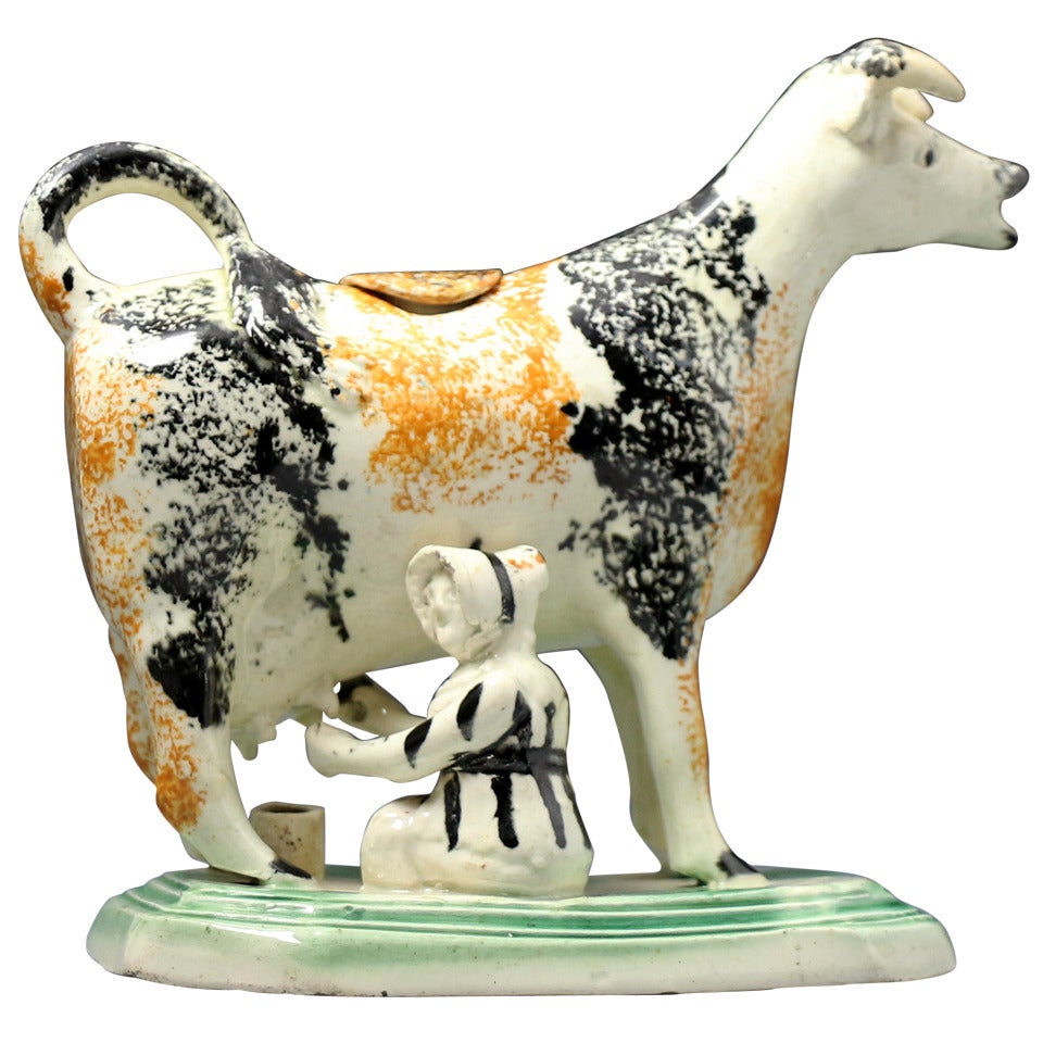 Antique English pottery figure of a cow in the form pof a creamer