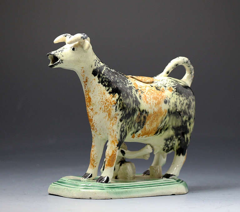 Antique English pottery figure of a cow in the form pof a creamer In Excellent Condition In Woodstock, OXFORDSHIRE