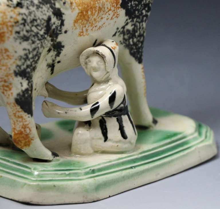 19th Century Antique English pottery figure of a cow in the form pof a creamer