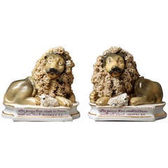 Pair of antique Staffordshire figures of The Lion and the Lamb, John and Rebecca Lloyd c1836
