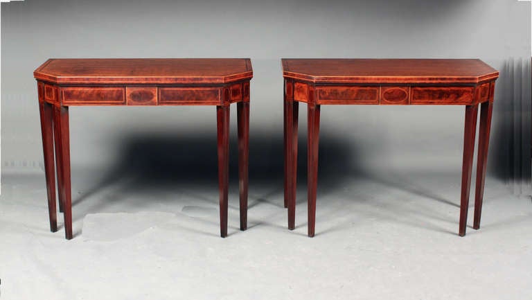 A fine pair of George III Sheraton period mahogany tea tables of a good original color and patina.