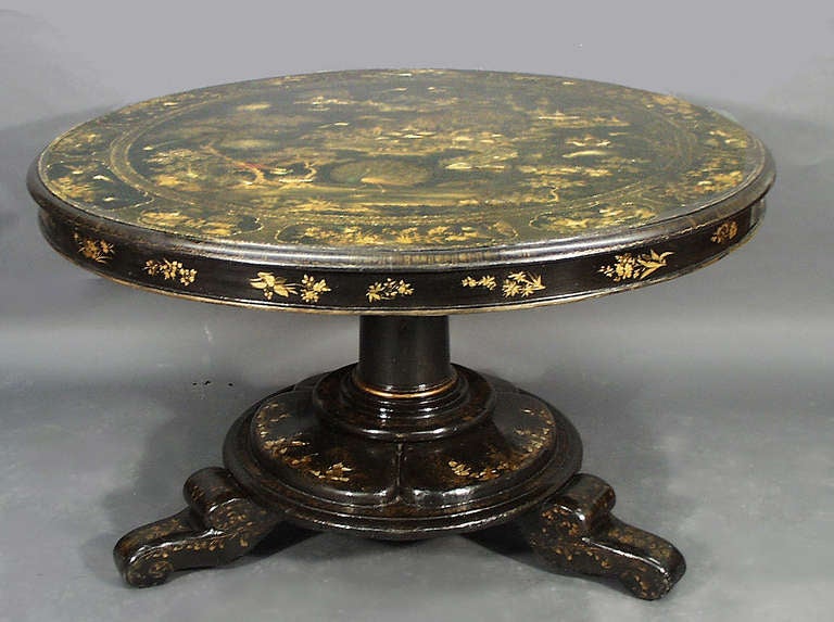 A fine large English centre table: the papier mache top inlaid with mother o' pearl and delicately painted with highly detailed chinoiserie and exotic birds. Probably by Jennens and Betteridge

In the manner of Jennens and Betteridge