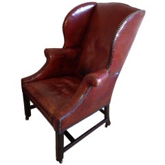 Antique A George III mahogany wing armchair