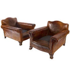 A Pair Of 1930's Leather Club Armchairs
