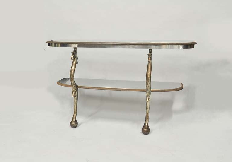 Two tier, demi lune console table with horse details in the style of Maison Jansen.