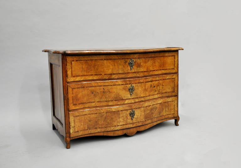 Northern Italian 18th Century chest of drawers made from several different inlaid timbers.
