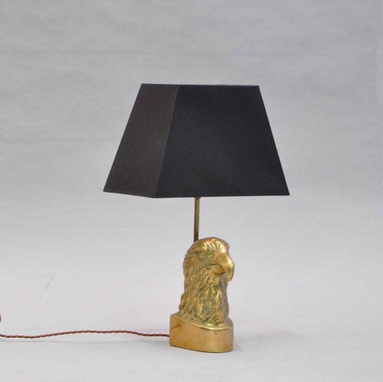 Solid brass Eagle table lamp with duplex fitting. Shown with rectangular black card shade.