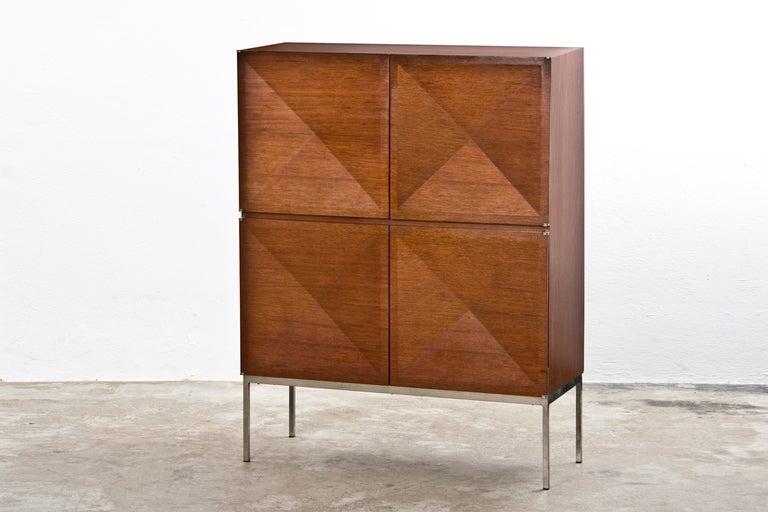 Highboard with diamond shaped doors designed by Antoine Philippon and Jacqueline Lecoq, manufactured by Behr.