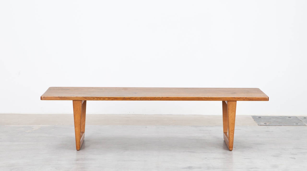 Coffee table designed by Børge Mogensen in 1956. The table is made in solid oak and has an interesting base construction. Surfaces and legs are in very good condition. Manufactured by Fredericia Stolefabrik. 

While simplicity, durability and