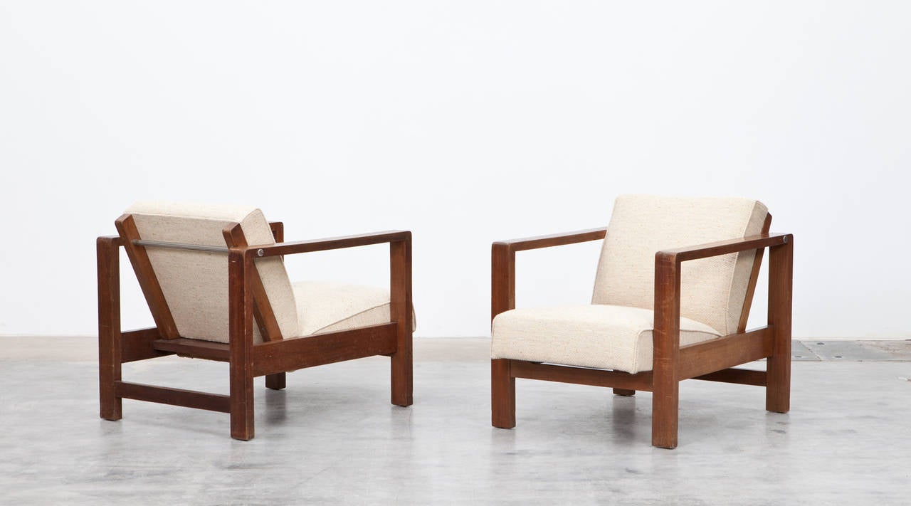 Lounge chairs in oak, new upholstery, Erich Dieckmann, Germany, 1928.

The two lounge chairs by Erich Dieckmann from 1928 are made out of solid oak in a decidedly clear design. The rectangular stand construction matches the newly upholstered seat