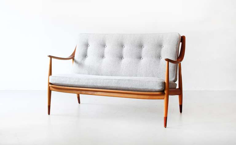 Beautiful sofa by Peter Hvidt and Orla Mølgaard-Nielsen. The cushions are newly reupholstered with 