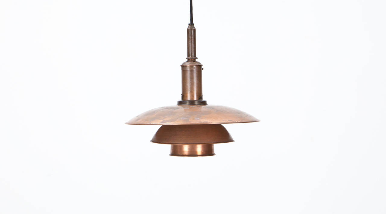 Very rare ceiling Lamp of Poul Henningsen pendants with copper shades and nickel-plated fitment. Designed by Poul Henningsen in the 1940s. The Lamp is in good conditions and has a beautiful patina. Manufactured by Louis Poulsen.
 