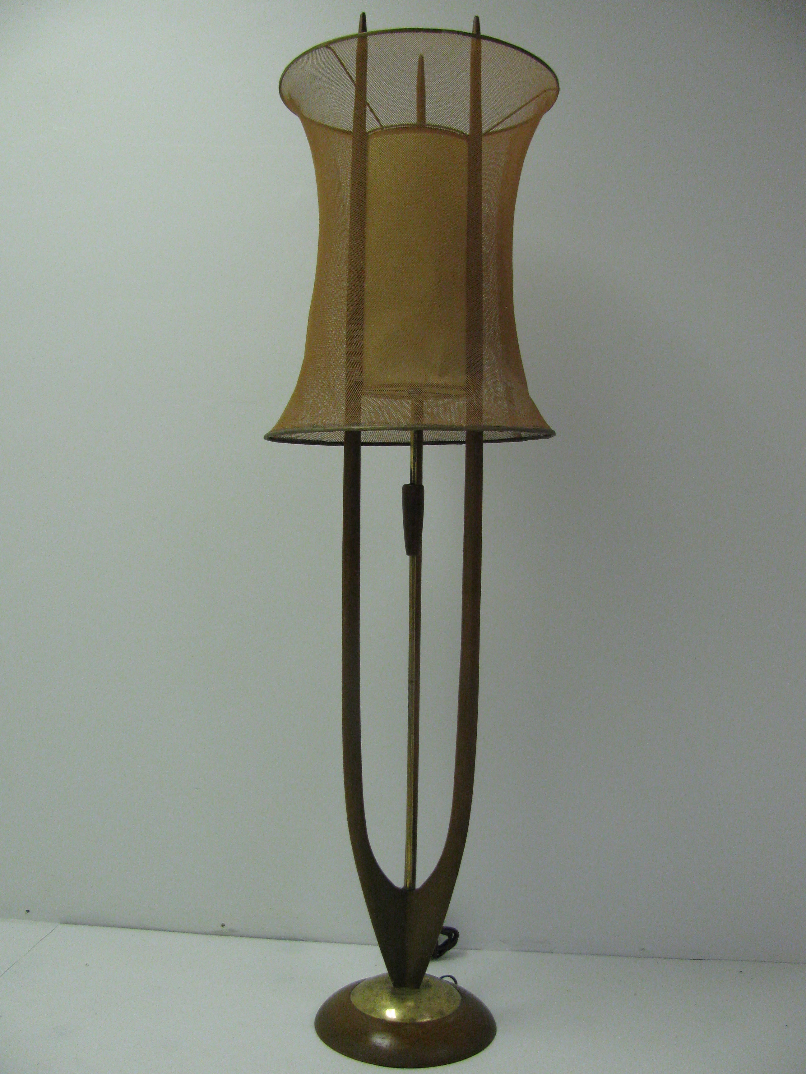 Lamp has been polished and rewired since photos were taken. Very interesting and unique floor lamp with copper mesh shade. Paper shade sits between walnut triple spire. Walnut handle on brass center rod is the on/off switch. Table lamps pictured are