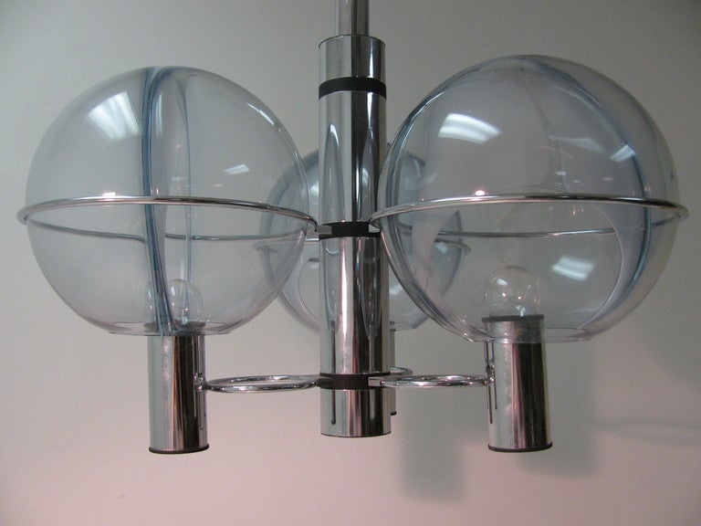Three Organic Art Glass Globes With Translucent Interior Shade. The Shade Spans The Center Of Each Globe In A Crescent Shape. Each  Globe Rests In A Separate Cradle, Which Are Nickel Chrome Rings. 37 in.Hgt is just the fixture not including any