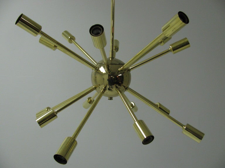 Pair of Classic Sputnik Chandeliers From The Mid Fifties. Chandeliers Were Completely Disassembled, Cleaned, Polished and Rewired. All Original , Solid Brass. Sixteen Lights Supply The Illumination. Height of Fixture can be Adjusted, Presently 38.5