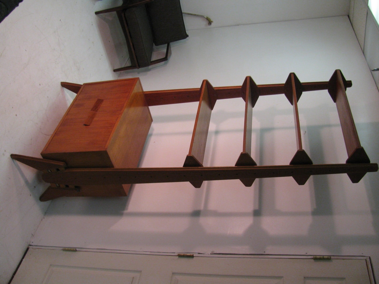 Simple and Elegant Shelving unit in Teak. Multi Functional, Shelves are 10 x 30. Cabinet is 15d x 30.5w x 17.5h.  All Inquiries please call or just Press Contact Dealer Button.