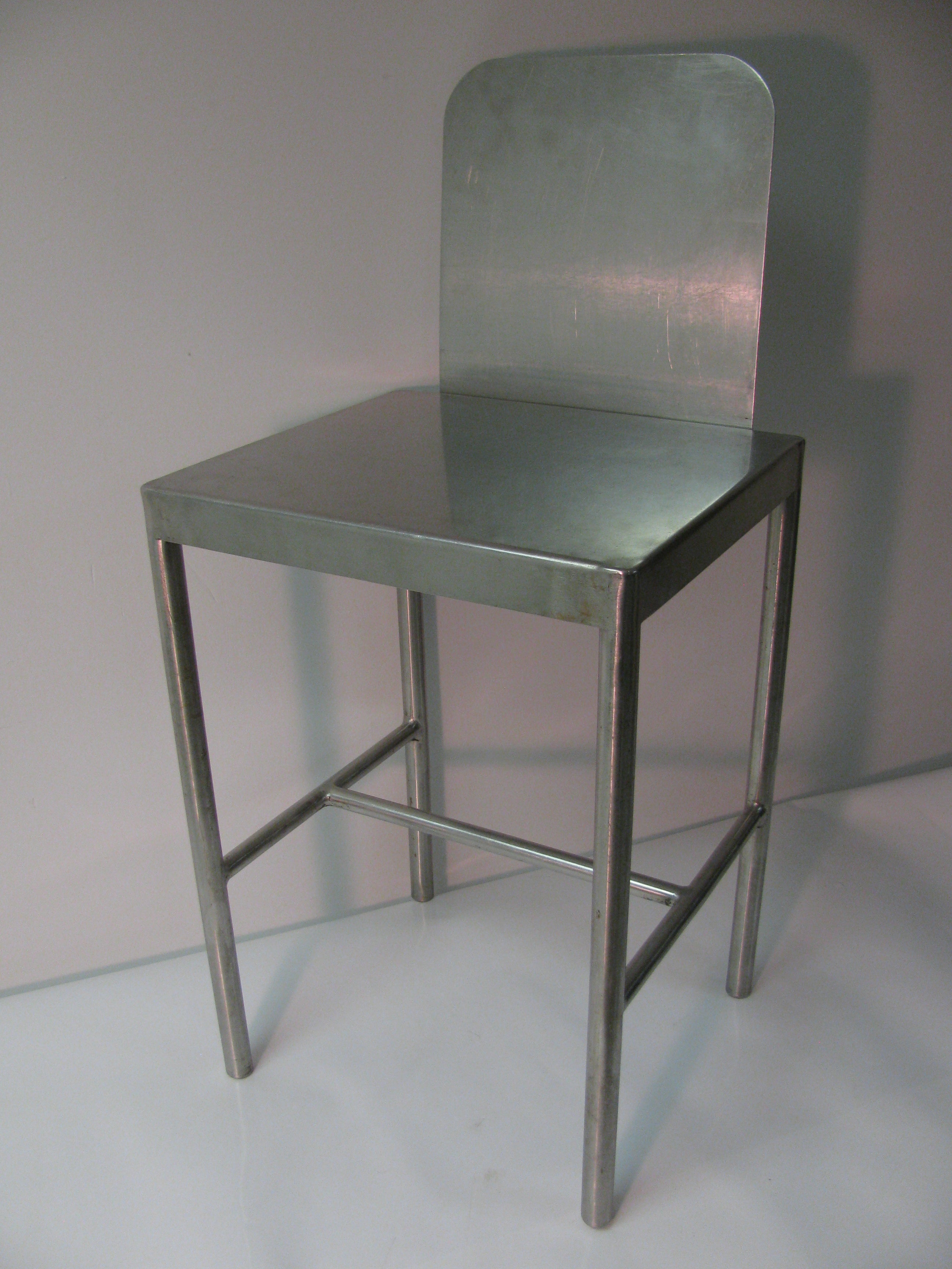 Modernism in stainless steel. Pair of stools well constructed and in like new condition.