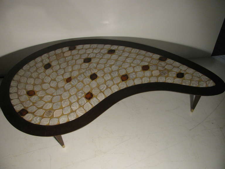 A beautiful original from Hohenberg. Handmade tiles in the shape of leaves with a walnut kidney shaped frame. In excellent vintage condition with minimal wear.