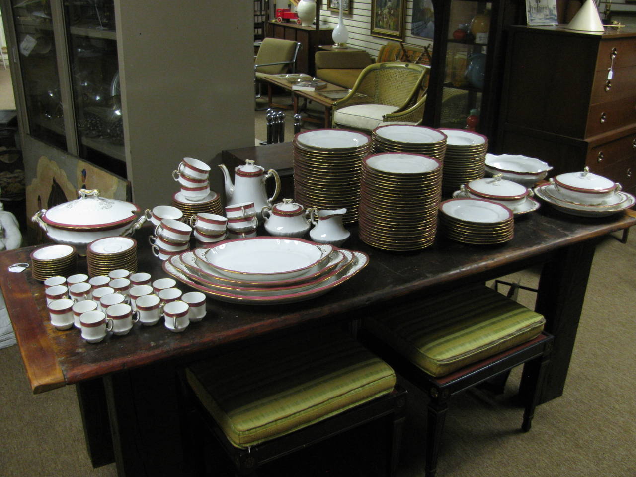 50 dinner plates 9.75 in., 34 lunch / salad plates 9 in., 17 deep soup bowls 9.5 in., three round platters 14.25 in and 2 12 in., four graduated oval platters 21, 19, 16.5, and 14 in., 15 tea cups with 16 saucers, 12 coffee cups with 13 saucers,