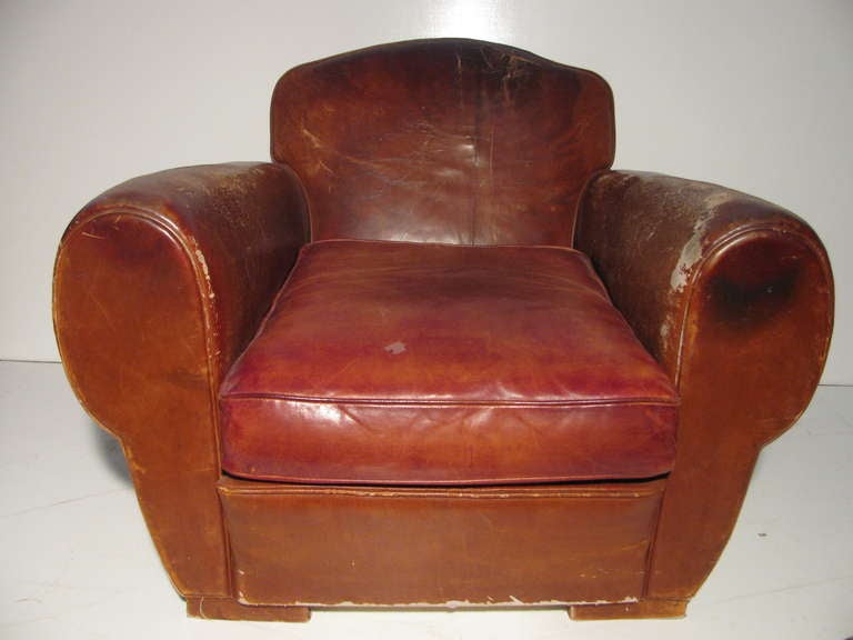 Leather Club Chair Worn In Like An Old Saddle. Has That Ralph Lauren Look, And Is Very Comfortable. Cushion Is Twenty Years Old. Frame Is Solid And In Excellent Structural Condition.