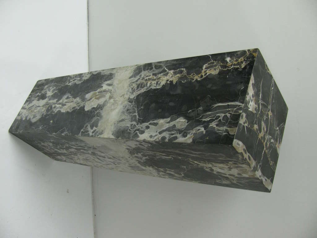 Simple And Elegant Square Cut Black Portoro Marble Pedestal. Beautiful Gold And White Veining With Mitered Construction. All Edges Are Mitered From One Inch Thick Veneers And Have Retained Their Original Beauty. All Inquiries Please Call Or Just