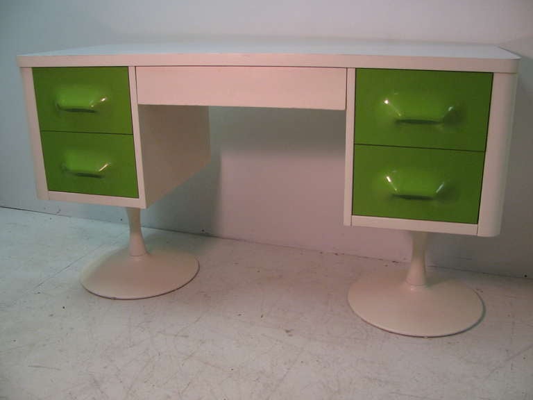 Amazing Space Age Desk In The Style Of Raymond Loewy. Injection Molded Plastic Drawer Fronts Are In Excellent Condition. Laminate Top With Lacquered Wood Case. Tulip Base. Very Well Constructed, Drawers Glide Effortlessly. 
Matching Six Drawer with